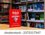 Small photo of Setif, Algeria - October 07, 2023: Close up Ryan Holiday's Ego Is the Enemy book in the bookshop.