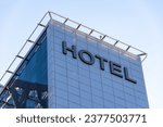 Small photo of Setif, Algeria - October 07, 2023: Low-angle view of Park Mall Hotel and Conference Center building against a blue sky.