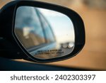 Objects in mirror are closer...