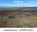 
solar panels at sunset.Aerial panorama landscape view of renewable technology.Green deal  concept clean energy. distribution of energy,Powerplant,energy transmission,high voltage concept