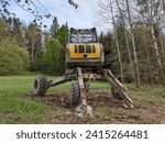 Small photo of Brno, Czech republic- January 20, 2024: Forest digger Menzi Muck A91 in the forestduring earthworks.