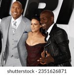 Small photo of Dwayne Johnson, Michelle Rodriguez and Tyrese Gibson at the World premiere of 'Furious 7' held at the TCL Chinese Theatre IMAX in Hollywood, USA on April 1, 2015.