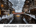 Small photo of Japan - January 30, 2019 : Scenic view of Old Hot Spiring Accomodation in Winter with Illumination in the evening, Ginzan Onsen is most famous Hot Spring in Yamagata, Japan