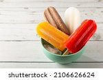 Colorful popsicles of different flavors.