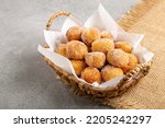 Small photo of Basket with rain cookies. In Brazil known as "bolinho de chuva".