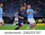 Small photo of Rome, Italy 30.10.2023: Lucas Beltran of Fiorentina, Patric of Lazio in action during the Italy Serie A TIM 2023-2024 football , between SS Lazio vs ACF Fiorentina at Olympic Stadium in Rome.