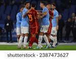 Small photo of Rome, Italy 12.11.2023: Yellow card for Ciro Immobile after the foul Gianluca Mancini of Roma inItaly Serie A TIM 2023-2024 day 12, derby football match SS Lazio vs AS Roma at Olympic Stadium