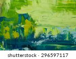 Abstract art  background. Oil painting on canvas. Green and yellow  texture. Fragment of artwork. Spots of oil paint. Brushstrokes of paint. Modern art. Contemporary art.