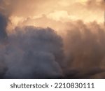 Small photo of Heavy clouds fill sky portending rain and a change in weather.