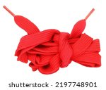 Red shoelaces knot isolated on white background. Laces for shoes or sneakers tied in huge knot 