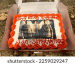 Small photo of Islip Terrace, NY, USA, 11.30.21 - The top down view of a Supernatural themed cake that says "Carry on my wayward son - Supernatural".