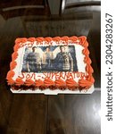 Small photo of Islip Terrace, NY, USA, 11.30.21 - The top down view of a Supernatural themed cake that says "Carry on my wayward son - Supernatural".