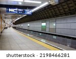 Small photo of Tokyo, Japan-September 25, 2018: Profound interior tunnel pattern of subway terminal