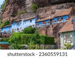 Small photo of Eschbourg, France - July 27, 2021: Historic rock dwellings, Maison des rochers, in Graufthal. Bas-Rhin department in the Alsace region of France