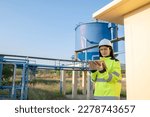 Environmental engineers work at wastewater treatment plants,Female plumber technician working at water supply