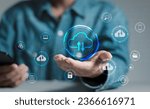 Small photo of Cloud technology concept. Businessman shows cloud storage network technology icon, large network of backup platforms, online data storage for business networks with cyber security software.