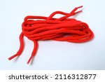 red shoe laces isolated on... | Shutterstock . vector #2116312877