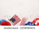 USA holiday banner with american flag,confetti stars on white background. Happy Independence day, Red, blue and white paper decorations. Flat lay, top view, copy space