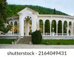 A beautiful view of the arched portal of the colonnade in the village of Staraya Gagra from the sea. Abkhazia.