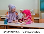 Female hijab muslim teacher...