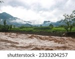 Small photo of Heavy Flood after Heavy Rain In the Local Stream. Flood Water Entered very Fast to the Houses and Shops . Houses to Near The Ban are Destroyed Badly. Swat Valley. Dated 24th August 2022.