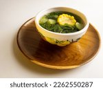 Sayur bening bayam, Spinach Clear Vegetable. Indonesian food of spinach, spinach soup with corn and chayote. selected focus