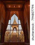 Small photo of the royal crematorium;glimps of main pyre through window pane