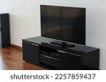 Home entertainment multimedia center in living room: Smart tv, audio system and other devices