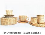 Small photo of Wicker Basket collection. Some Rattan wicker basket, bamboo wicker basket and placemat. Isolated on White background. Bright. Receptacle. Vessel. Container. Household stuff. Selective Focus.
