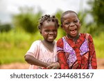 Small photo of Abuja, Nigeria - July 5, 2022: Portrait of an African Child. Random Candid Moments with African Children. Happy African Child. Children's Day in Africa.