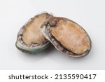 Small photo of One with abalone. The length of the shell is 10-20 cm, and it is oval in shape and is brown or bluish-brown. The opening of the shell is wide and the holes are lined up on the outside.