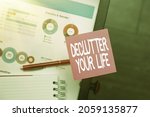 Small photo of Text caption presenting Declutter Your Life. Internet Concept To eliminate extraneous things or information in life Thinking New Bright Ideas Renewing Creativity And Inspiration