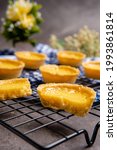 Small photo of The egg tart is a kind of custard tart found in Cantonese cuisine derived from the English custard tart and Portuguese pastel de nata. Egg tarts are often served at dim sum restaurants and cha chaan