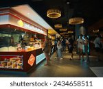 Small photo of Chinatown, Sydney, Australia - April 17 2022 : The brightly light Lanzhou beef noodle takeaway store is teeming with people eager to order and partake their iconic handmade noodles soup dishes.
