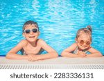 Happy children in swimming pool....
