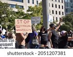 Small photo of Washington, DC, USA - October 2, 2021: Woman Holds a Sign That Says, Stop Manhandling Women’s Rights” at the Women’s March at Freedom Plaza