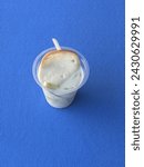 Small photo of traditional Burmese sweet dessert (shwe yin aye) in a plastic cup