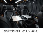 comfortable passenger bus interior with upholstered seats; individual transfer for a group of people; conversion of the interior of a truck;