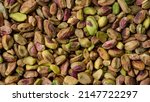 Small photo of Pistachios without shell top view. Pistachio nuts. Whole nut kernels