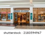 Small photo of Buffalo, New York, USA - July 23, 2022: A Premier Gourmet store in a shopping mall. Premier Gourmet is a purveyor of gift baskets, coffee, housewares, fine foods, beer, Buffalo gifts.