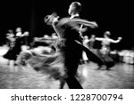Small photo of ballroom dance couple dancers waltz blurred motion black-and-white