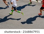 Small photo of group runners athletes run marathon race top view