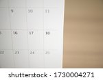 calendar page close up on wood... | Shutterstock . vector #1730004271