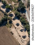 Small photo of Aerial view of Cantalloc Aqueduct in Nazca, spiral shaped aqueducts or wells in Peru, a fine example of Inca technology and architecture.