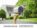 Mailbox stands tall against a...