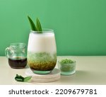 Small photo of es cendol dawet contains green cendol droplet with coconut milk and sugar sauce. Its fresh, sweet, and legit taste makes this drink a favorite of many people, especially during hot weather.