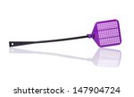 Small photo of Single purple flyswatter isolated on white background with reflections. Object made of plastic, very efficient and unfailing tool in catching flies. Horizontal orientation.