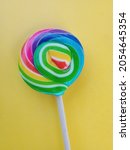 Small photo of Lollipops are the favorite sugar candy that has existed since time immemorial. The origin of lollipops is thought to have come from the way ancient humans used to collect honey using sticks.