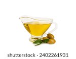 Small photo of Bowl of fresh olive oil and olives with leaves isolated on white background. Delicious olive oil in a glass bowl. olive oil bottle.
