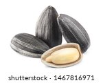 Close-up of delicious sunflower black seeds, isolated on white background